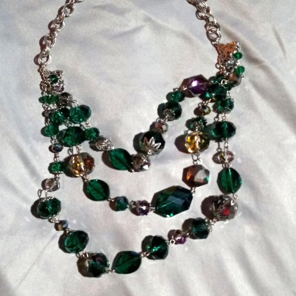 K-4 silver toned 3 strand with green,purple, and amber crystals 13"-15" necklace
